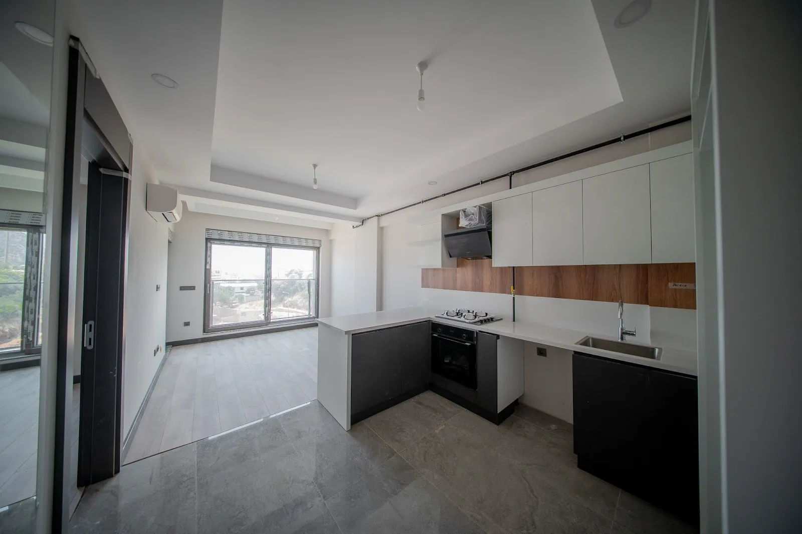 Tuana Park Evleri 1+1 daire mutfak ve yaşam alanı